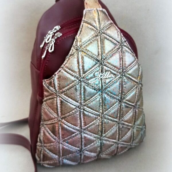 Sling bag metalic triangels
